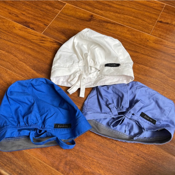 Like new Jaanuu scrub caps: white, royal blue & that hospital periwinkle color - Picture 3 of 3